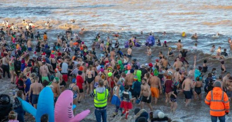 Defiant swimmers to brave the wintery North Sea as popular seaside dip returns Defiant swimmers to brave the wintery North Sea as popular seaside dip returns