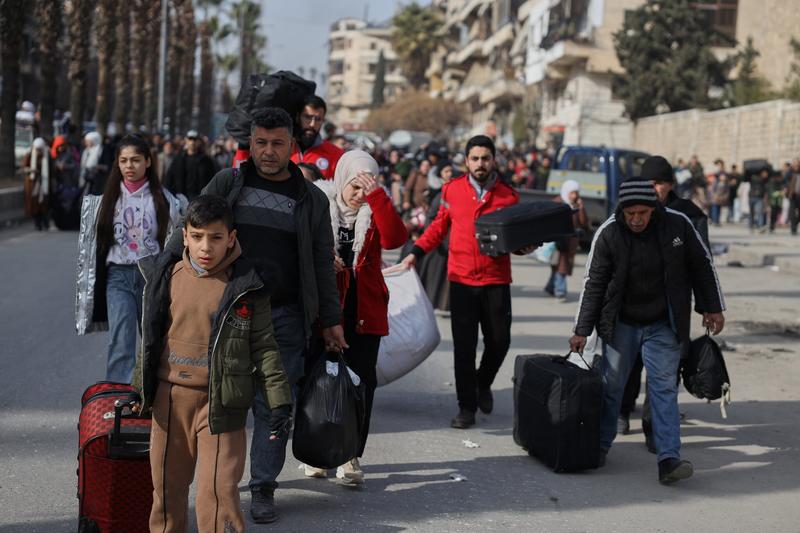 Civilians flee Aleppo as clashes between Syrian government and Kurdish forces escalate