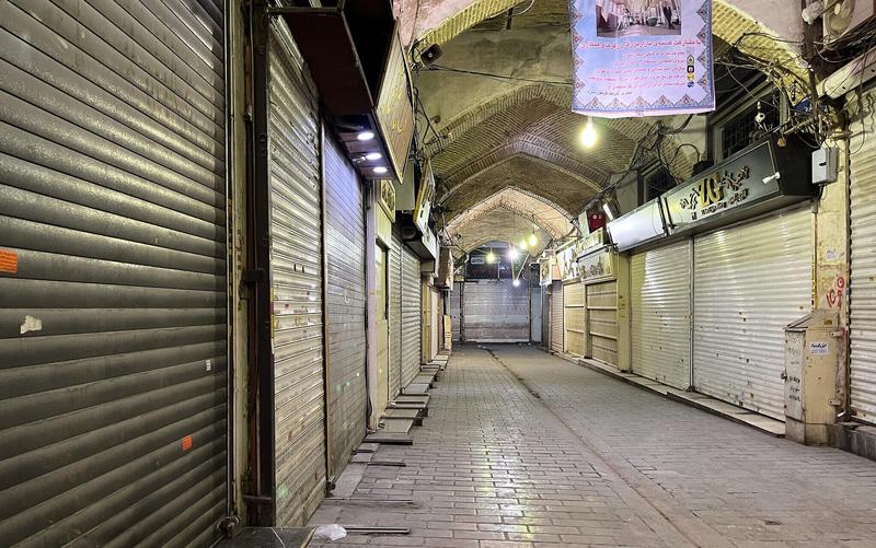 Iran’s merchants, bankrollers of 1979 revolution, turn against clerics