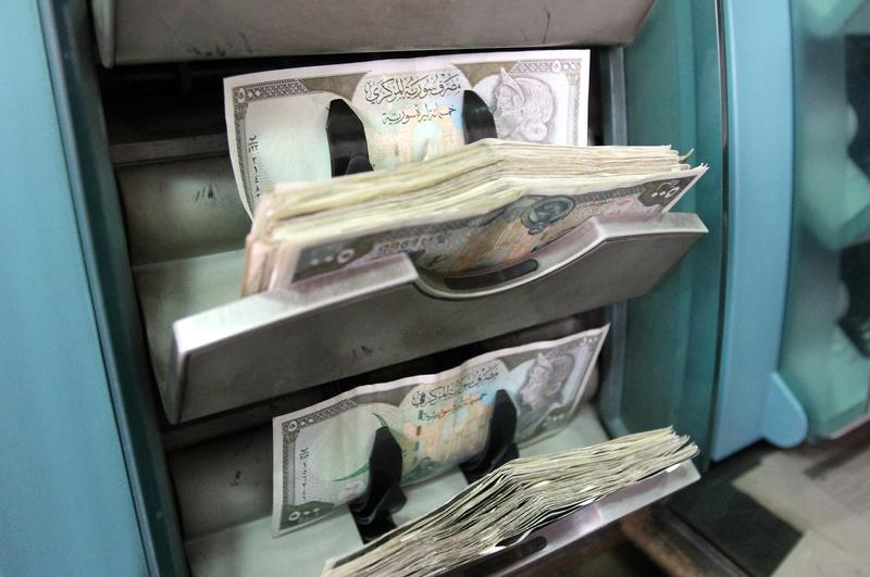 Qatari company to acquire major stakes in Syrian banks