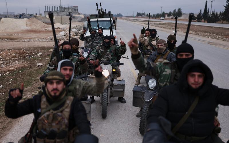 Syrian government forces enter towns in north after Kurdish fighters withdraw
